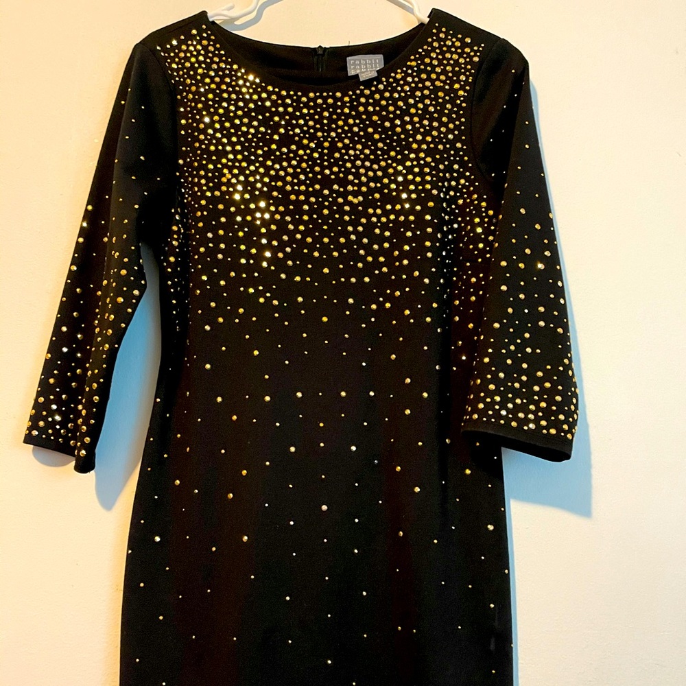Dress with black sleeves with bronze stones